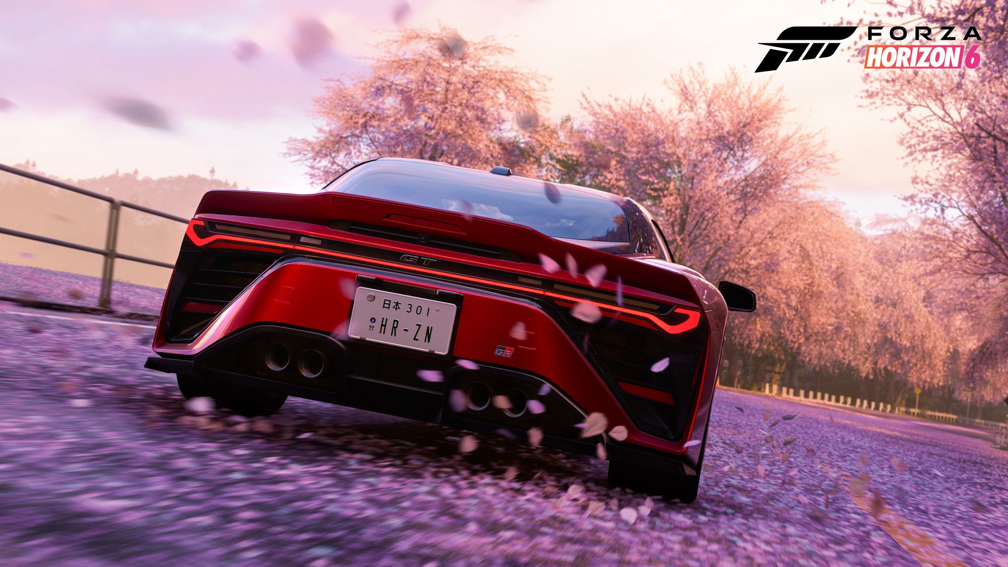 桜並木を走る赤いスポーツカー。Forza Horizon 6の公式ゲーム画像